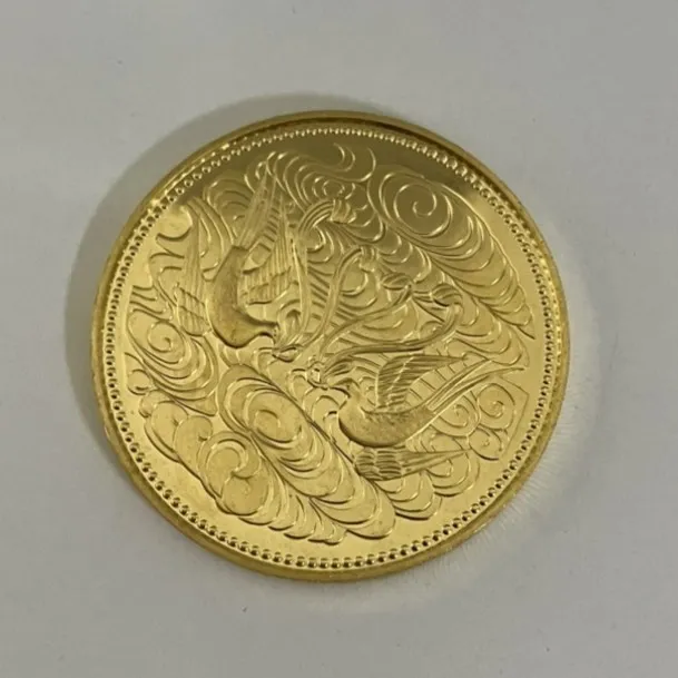 天皇陛下御在位六十年記念10万円金貨