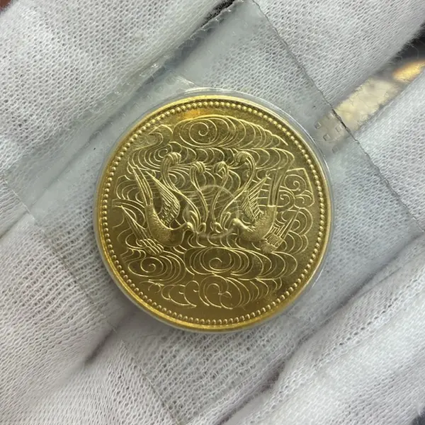 天皇陛下御在位60年記念10万円金貨