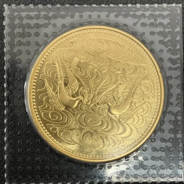 天皇陛下御在位60年記念10万円金貨
