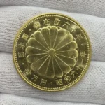 天皇陛下御在位60年記念10万円金貨