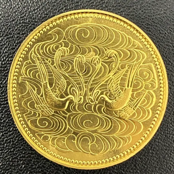 天皇陛下御在位60年記念10万円金貨
