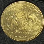 天皇陛下御在位60年記念10万円金貨