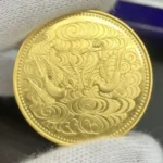 天皇陛下御在位60年記念10万円金貨