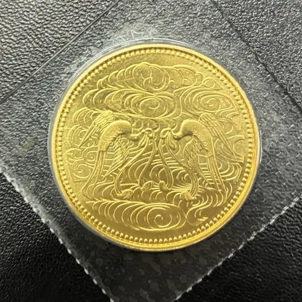 天皇陛下御在位60年記念10万円金貨