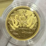 天皇陛下御在位60年記念10万円金貨