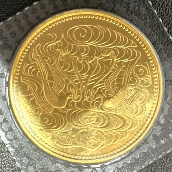 天皇陛下御在位60年記念10万円金貨