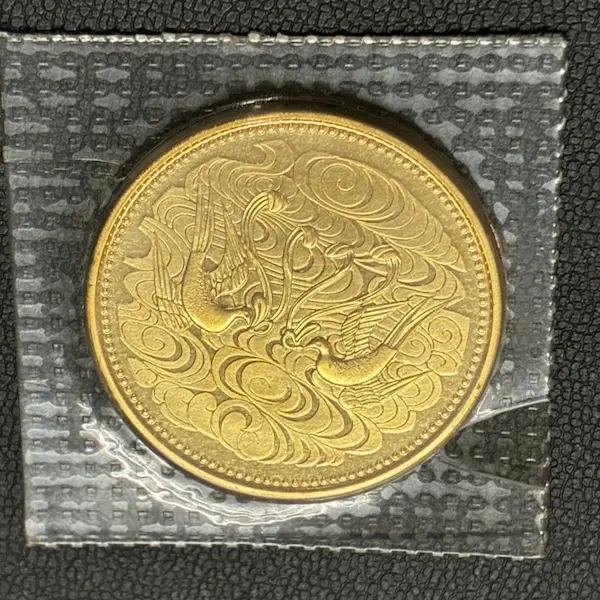 天皇陛下御在位60年記念10万円金貨