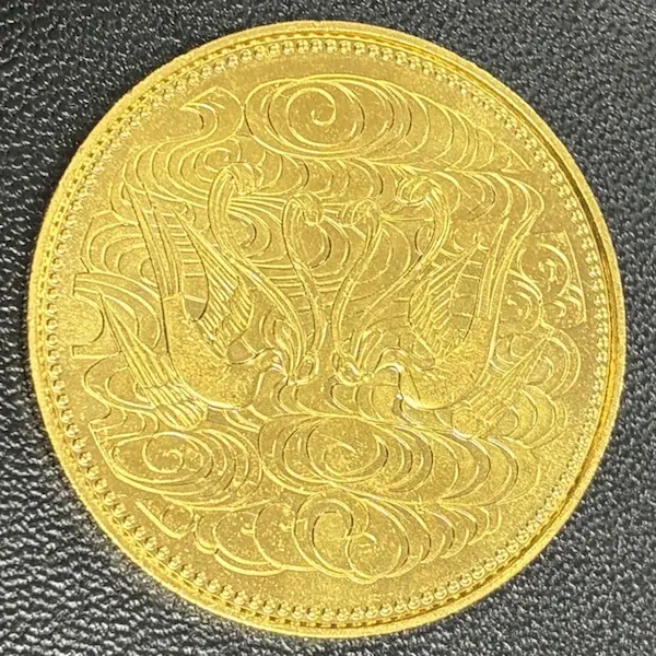 天皇陛下御在位60年記念10万円金貨