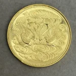 天皇陛下御在位60年記念10万円金貨